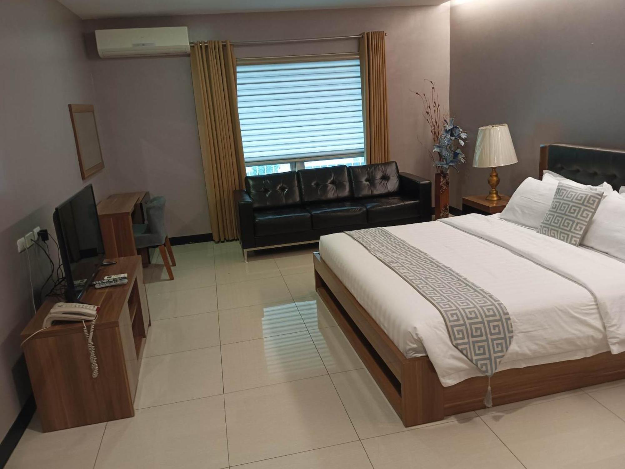 Ybc Grand Hotel โอลองกาโป ห้อง รูปภาพ